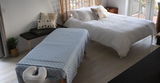 Massage table by 7 mile island massage setup in Lokal Hotel Cape May suite for an in room massage